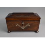 A Mid 19th Century Rosewood Tea Caddy of Sarcophagus Form with Mother of Pearl Inlay. Two Removable