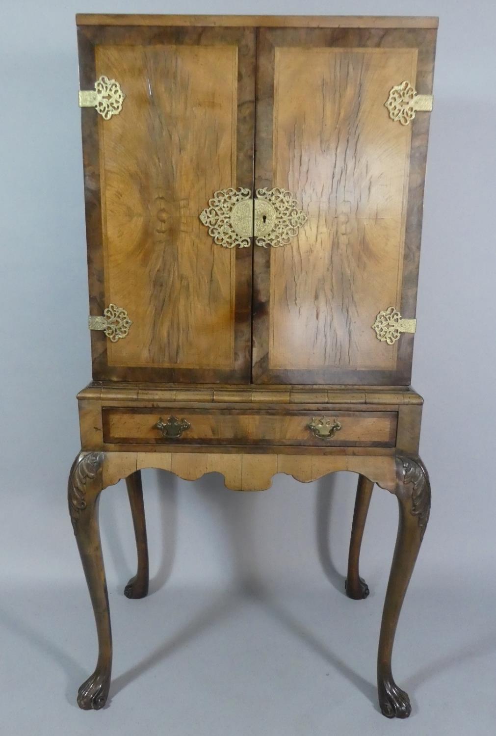 A Late 19th Century Crossbanded Walnut Cabinet on Stand with Cabriole Supports, Centre Long Drawer