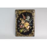 A Victorian Lacquered Papier Mache Panel with Painted and Mother of Pearl Inlaid Floral