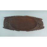 A Far Eastern Carved Tray or Bowl, 68cms Long