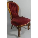 A Victorian Walnut Framed Button Upholstered Balloon Back Ladies Nursing Chair
