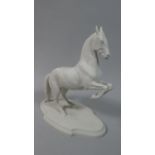 A Levarde Bisque Figure of Rearing Stallion, 22cm High