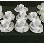 A Collection Lily of the Valley Pattern Teawares to Include Six Trios, Cups, Saucers and Cake Plate