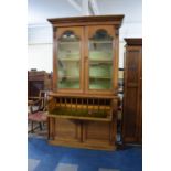 A Victorian Oak Secretaire Bookcase with Fitted Drawer Having Tooled Green Leather Writing Surface