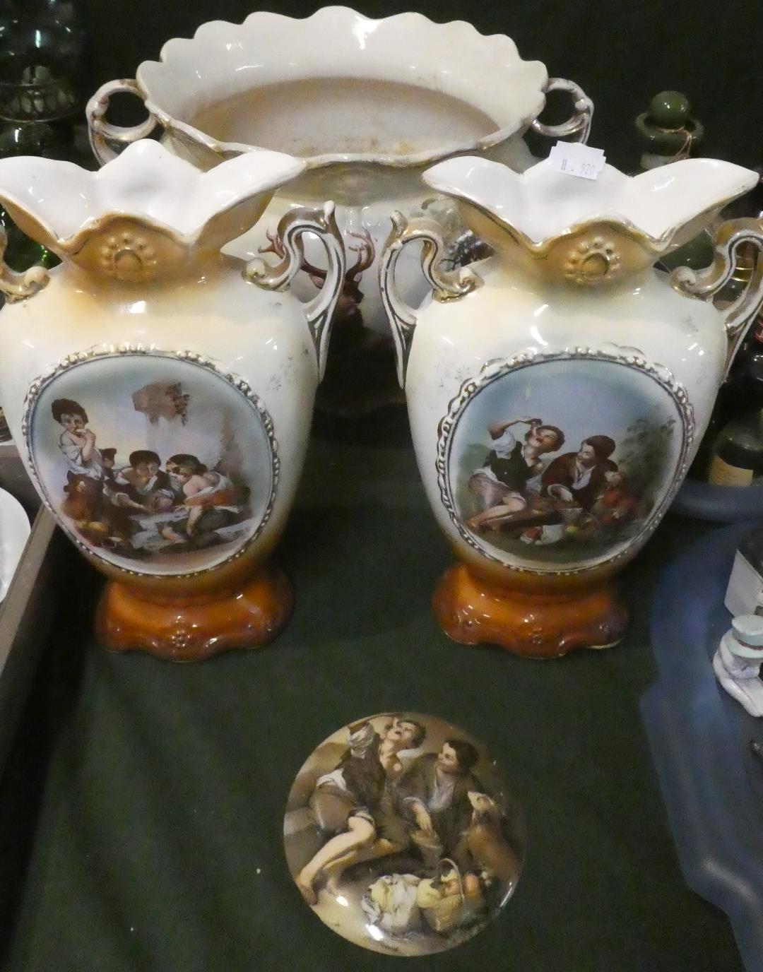 A Pair of Continental Vases, Two Handled Jardiniere and a Plaque