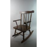 A Mid/Late 20th Century Child's Spindle Back Rocking Chair