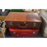 A Vintage Leather Suitcase and an Antler Example