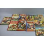 A Collection of Vintage Cowboy Annuals and Books to Include The Story of Robinson Crusoe by Daniel