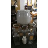 A Collection of Stoneware Jars, Collectors Bottles and a Ceramic Barrel