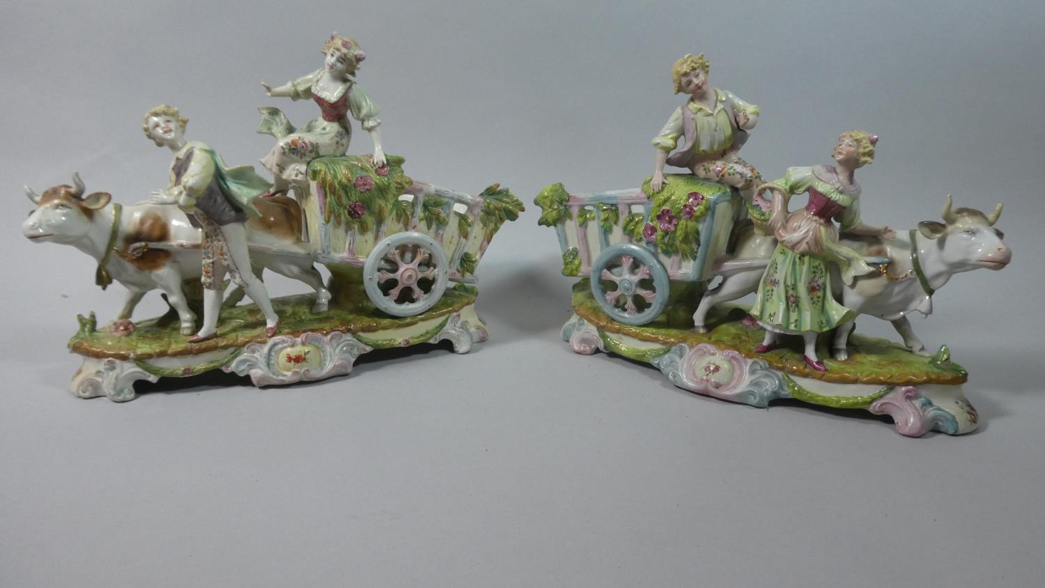 Two Continental Bisque Figural Groups Depicting Cow Pulling Cart with Lady and Gent, Set on Scrolled