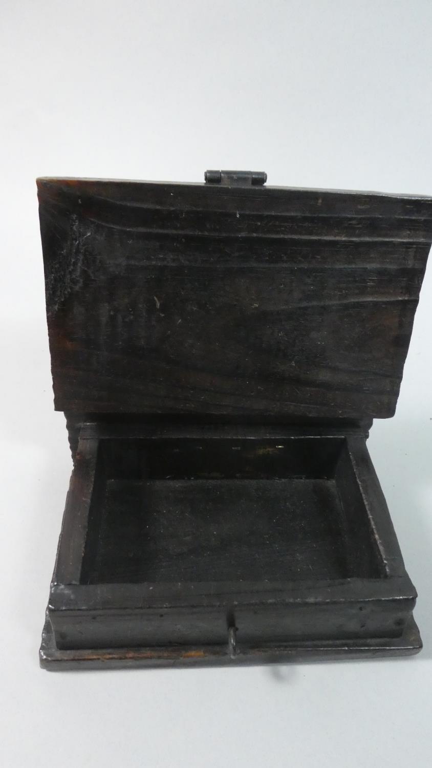 A Small Iron Mounted Wooden Box in the Form of a Book with Clasp, 18cm High - Image 3 of 3