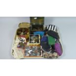 A Tray Containing Various Purses, British and Foreign Coins, Chinese Banknotes, Enamelled Badges Etc
