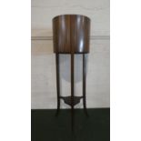 An Edwardian Cylindrical Mahogany Plant Stand on Tripod Support with Stretcher Shelf, Original Metal