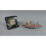 An Edwardian Travel Clock and a Silver Plated and Glass Oval Desktop Inkstand