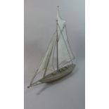 A Modern Metal and Glass Model of a Sailing Yacht, 50cm Long