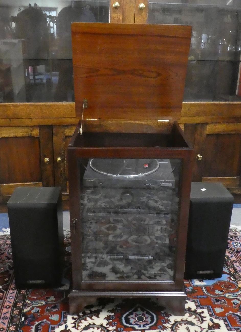 A Pioneer Stereo Stereo System in Mahogany Glazed Cabinet