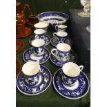 A Set of Six Blue and White Coffee Cans and Saucers Together with Matching Cream and Sugar