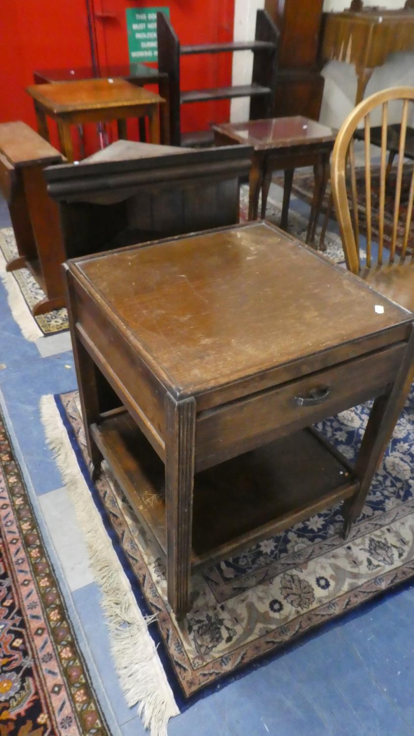 An Oak Square Top Trolley with Stretcher Shelf and Drawer Together with a Stained Pine Three Shelf