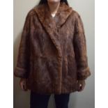 A Ladies Fur Coat by Colemans Sumberq