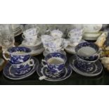 A Tray of Blue and White Coffee and Tea Cups and Saucers