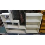 A White Painted Waterfall Bookcase and a Stepped Example