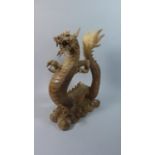 A Large Modern Carved Wooden Study of a Dragon, 41.5cm High