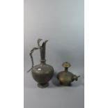 An Indian Brass Ewer with Etched Decoration and Entwined Cobra Handle Together with a Bronze