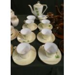 A Noritake Coffee Set Comprising Six Cups and Saucers, Cream and Sugar