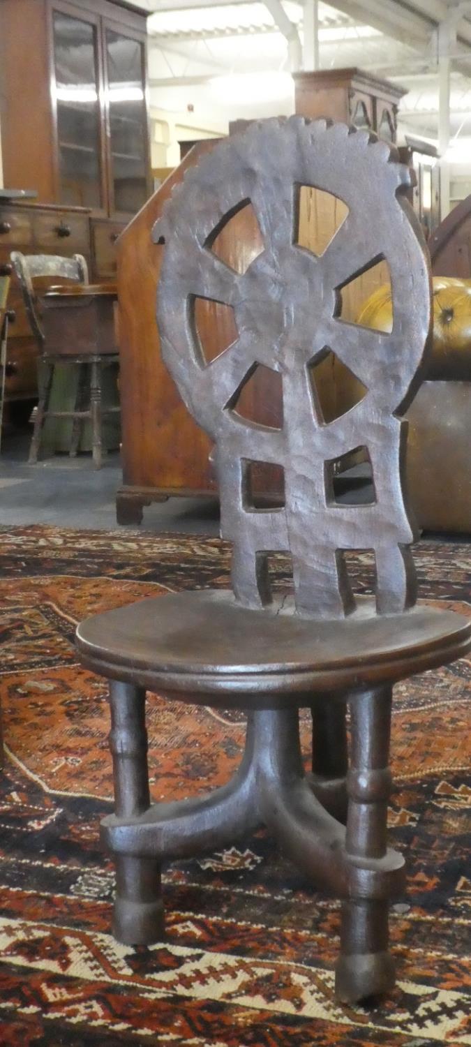 An Ethiopian Carved and Pierced Chair with Wheel Back - Image 2 of 2