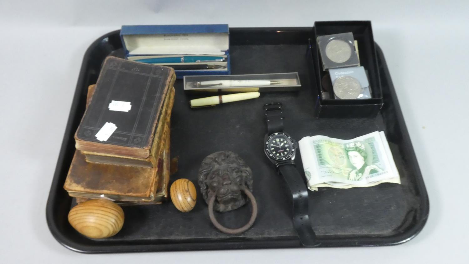 A Tray Containing Various Coins, Vintage £1 and 10 Shilling Bank Notes, Pens, Lion Mask Door