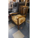 An Edwardian Oak Framed Ladies Nursing Chair with Pierced Back Splat