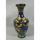 A Chinese Enamelled Copper Vase Decorated with Flowers, 24cm High