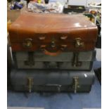 A Leather Suitcase and Two Vintage Examples