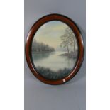 A Framed Oval Oil on Board Depicting Lake Scene, 48cm High