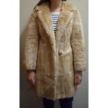 A Ladies Fur Coat by Coleman Sumberq
