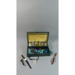 A Cantilevered Jewellery Box Containing Costume Jewellery and Wrist Watches Etc
