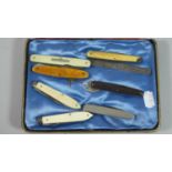 A Collection of Eight Vintage Penknives One with Etched Ruler Scale by Ratner Safes