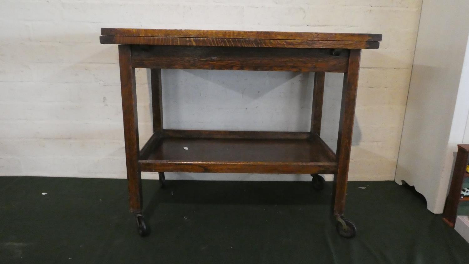 An Edwardian Oak Drawer Leaf Trolley with Stretcher Shelf, 32cm Long