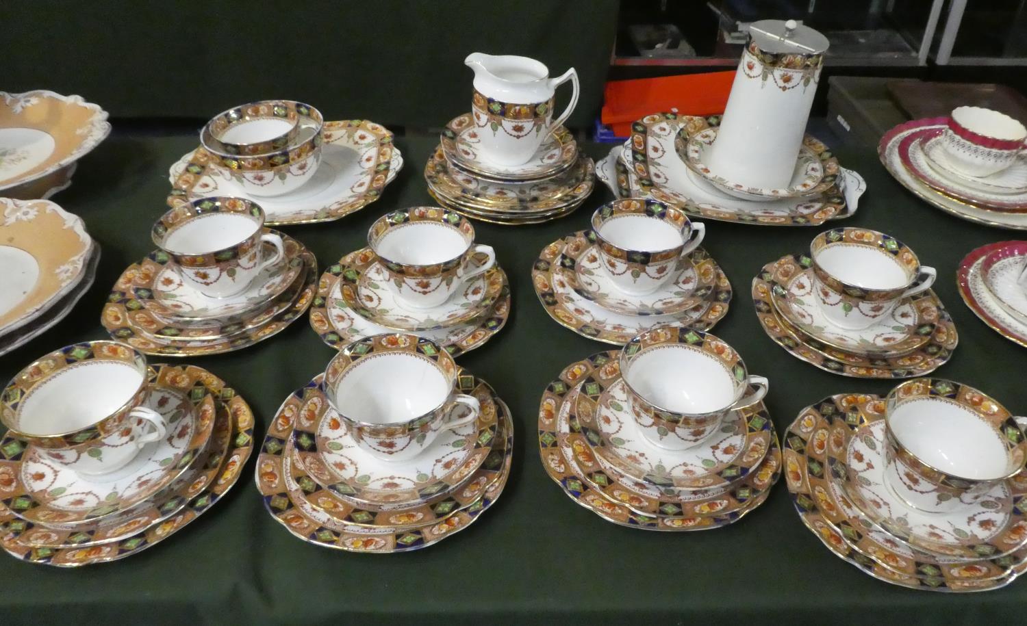 A Collection of Edwardian Teawares to Include Eight Trios, Two Bread and Butter Plates, Hot water