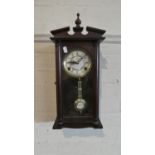 A Modern Mahogany Cased Wall Clock with Eight Day Movement, 48cms High