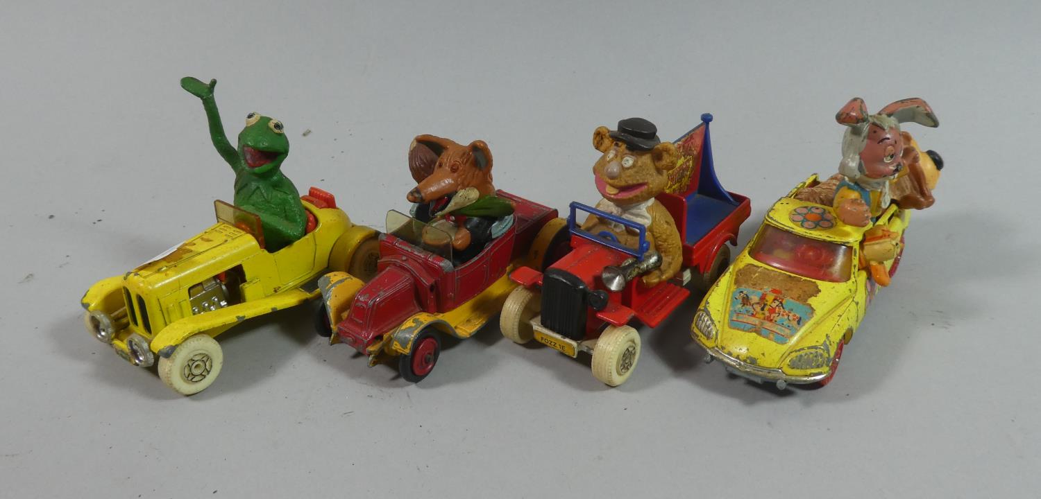 A Collection of Four Corgi Toys, Kermit the Frog, Basil Brush, Foggie and Magic Roundabout