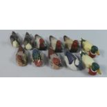 A Set of Eleven Avon Collector Duck Ornaments