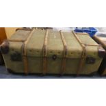 An Edwardian Canvas Wood and Leather Mounted Travelling Trunk, 95cms Wide