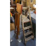 A Vintage Wooden Three Step Stepladder and a Folding Vintage Ironing Board