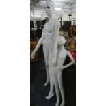 A Collection of Various Mannequin Parts, Lady and Child