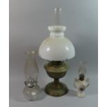 A Collection of Three Vintage Oil Lamps