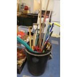 A Plastic Bin Containing Garden Tools