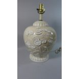 A Large Ceramic Baluster Vase Shaped Table Lamp decorated in Relief with Tree and Bird, 47cms High