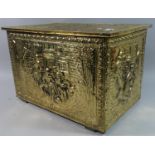 A Mid 20th Century Pressed Brass Log Box decorated in Relief with Tavern Scenes, 46cms Wide