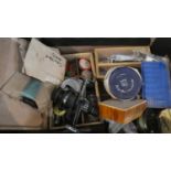 A Box Containing Various Angling Equipment to Include Fly and Sea Fishing Reels, Spinners and Lures,